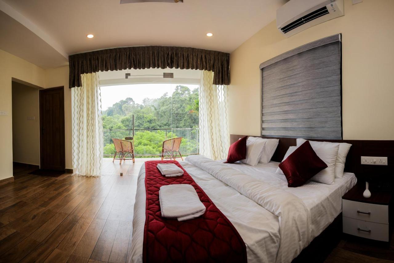 Thenmala Hormuz Inn Kolattupuzha Bagian luar foto
