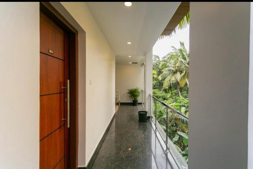 Thenmala Hormuz Inn Kolattupuzha Bagian luar foto