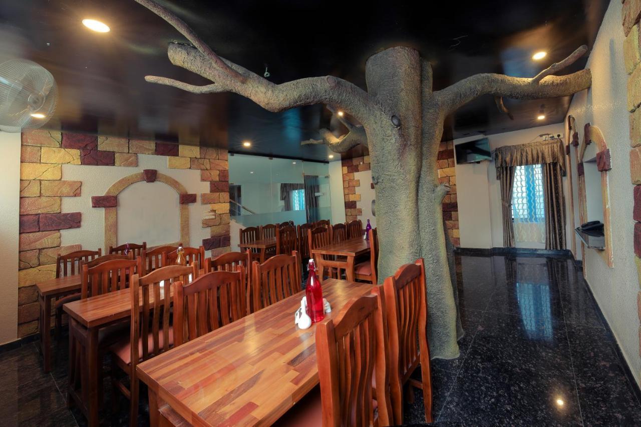 Thenmala Hormuz Inn Kolattupuzha Bagian luar foto
