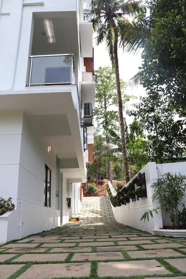 Thenmala Hormuz Inn Kolattupuzha Bagian luar foto