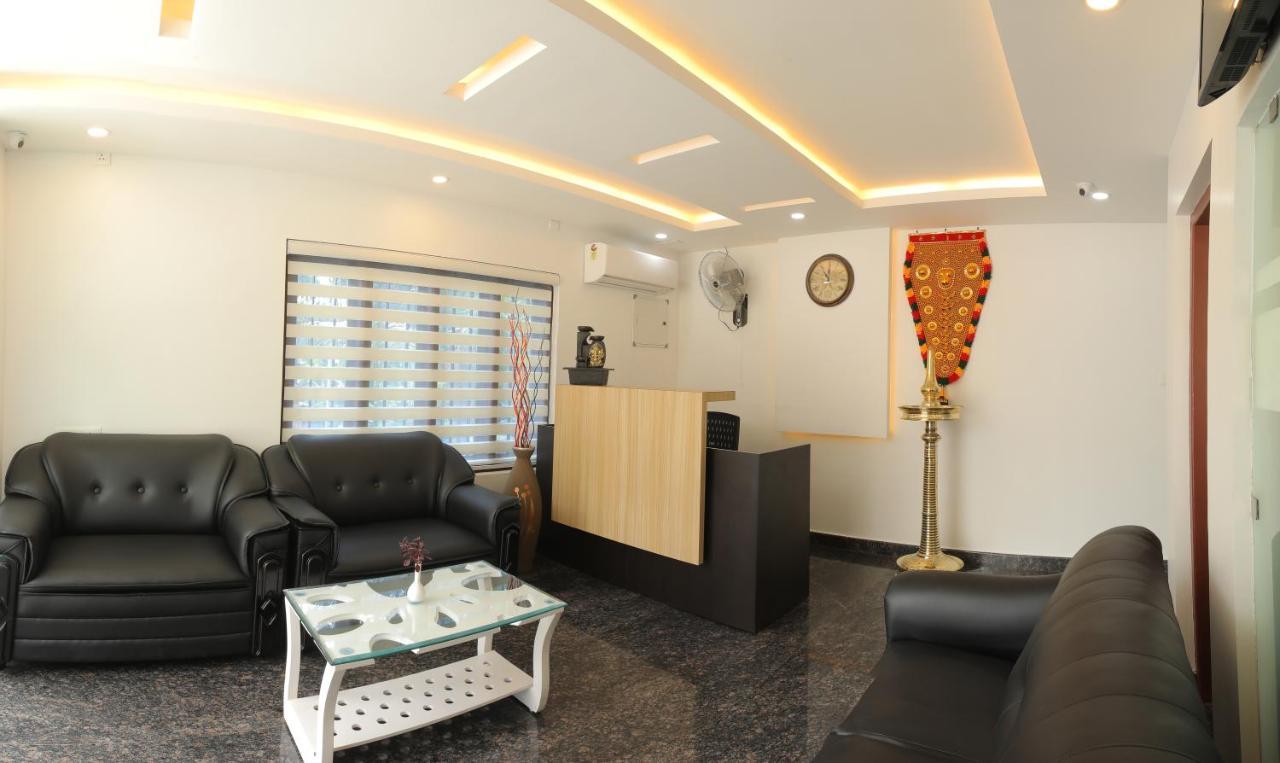 Thenmala Hormuz Inn Kolattupuzha Bagian luar foto