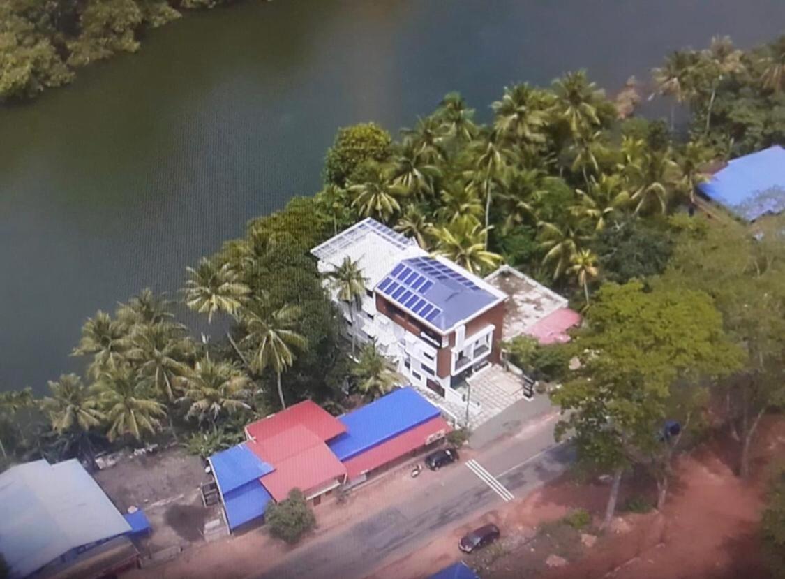 Thenmala Hormuz Inn Kolattupuzha Bagian luar foto